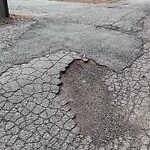 Pothole at 33 Fourth Ave