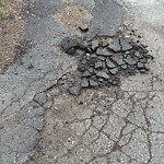Pothole at 7 Carson St