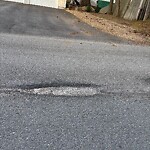 Pothole at 3 Sergi Ln